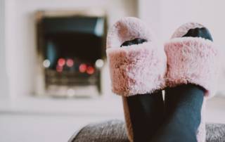 pink slippers fireplace